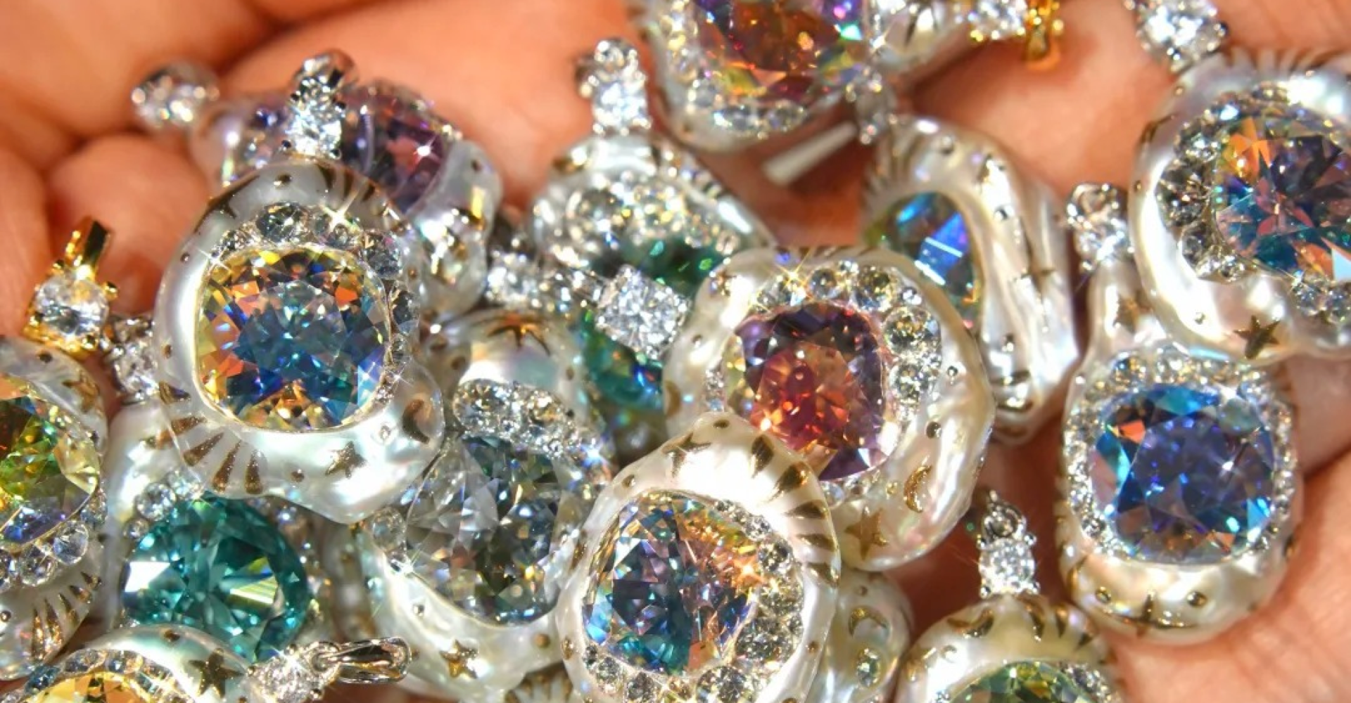 Colourful gemstone-set baroque pearl pendants handcrafted by Velnorisses